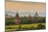 Myanmar. Bagan. Sunset over the Temples of Bagan-Inger Hogstrom-Mounted Photographic Print