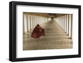 Myanmar, Bagan. Young Monk Walks the Hallway of Shwezigon Monastery in Bagan-Brenda Tharp-Framed Photographic Print