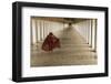 Myanmar, Bagan. Young Monk Walks the Hallway of Shwezigon Monastery in Bagan-Brenda Tharp-Framed Photographic Print