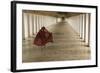 Myanmar, Bagan. Young Monk Walks the Hallway of Shwezigon Monastery in Bagan-Brenda Tharp-Framed Photographic Print