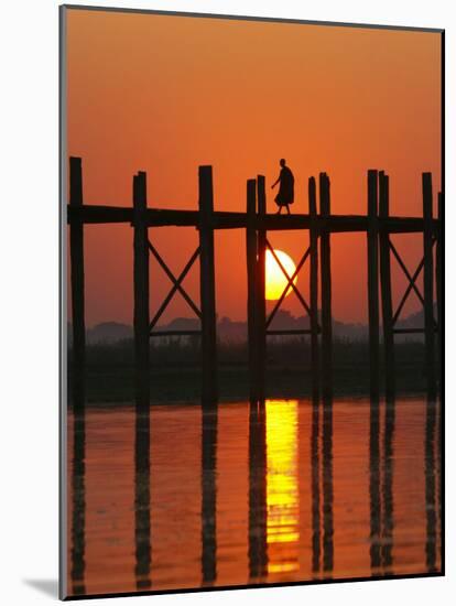 Myanmar (Burma), Amarapura, Taungthaman Lake, U Bein's Bridge, a Monk Walking Home at Sunset-Katie Garrod-Mounted Photographic Print