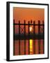 Myanmar (Burma), Amarapura, Taungthaman Lake, U Bein's Bridge, a Monk Walking Home at Sunset-Katie Garrod-Framed Photographic Print