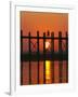 Myanmar (Burma), Amarapura, Taungthaman Lake, U Bein's Bridge, a Monk Walking Home at Sunset-Katie Garrod-Framed Photographic Print