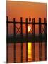 Myanmar (Burma), Amarapura, Taungthaman Lake, U Bein's Bridge, a Monk Walking Home at Sunset-Katie Garrod-Mounted Photographic Print