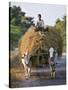Myanmar, Burma, Bagan, A Farmer Takes Home an Ox-Cart Load of Rice Straw for His Livestock-Nigel Pavitt-Stretched Canvas