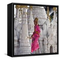 Myanmar, Burma, Lake Inle, A Young Novitiate Passes an Ornate Buddhist Shrine-Nigel Pavitt-Framed Stretched Canvas