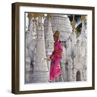 Myanmar, Burma, Lake Inle, A Young Novitiate Passes an Ornate Buddhist Shrine-Nigel Pavitt-Framed Photographic Print