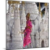 Myanmar, Burma, Lake Inle, A Young Novitiate Passes an Ornate Buddhist Shrine-Nigel Pavitt-Mounted Photographic Print