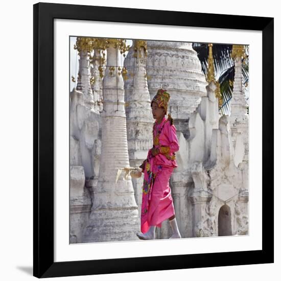 Myanmar, Burma, Lake Inle, A Young Novitiate Passes an Ornate Buddhist Shrine-Nigel Pavitt-Framed Photographic Print