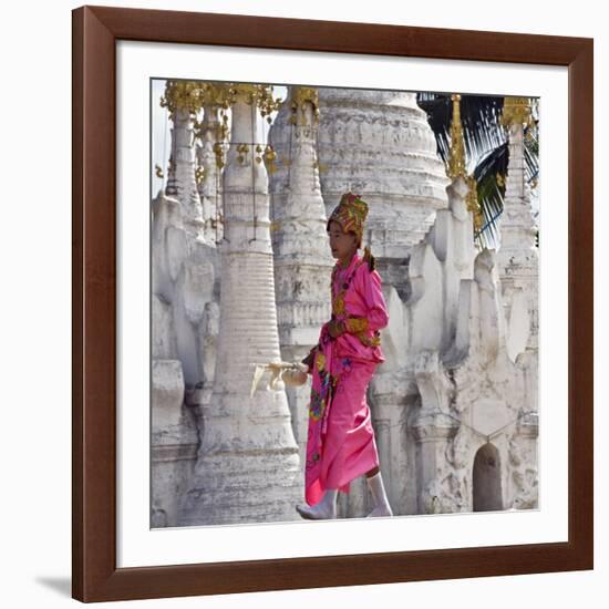 Myanmar, Burma, Lake Inle, A Young Novitiate Passes an Ornate Buddhist Shrine-Nigel Pavitt-Framed Photographic Print