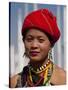 Myanmar, Burma, Loikaw; a Kayah Girl in Front of Ceremonial Posts at Chitkel Village-Katie Garrod-Stretched Canvas