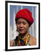 Myanmar, Burma, Loikaw; a Kayah Girl in Front of Ceremonial Posts at Chitkel Village-Katie Garrod-Framed Premium Photographic Print