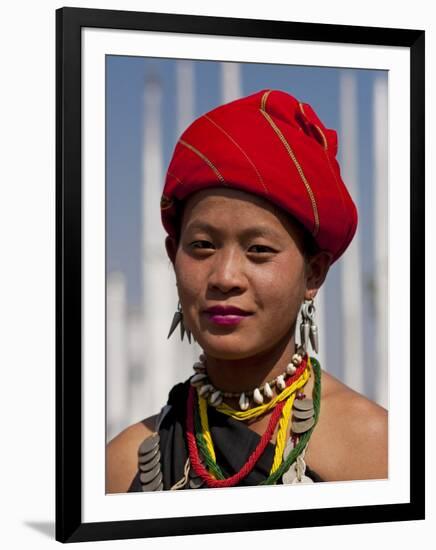 Myanmar, Burma, Loikaw; a Kayah Girl in Front of Ceremonial Posts at Chitkel Village-Katie Garrod-Framed Premium Photographic Print