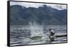 Myanmar, Inle Lake. Man Slaps His Paddle on the Surface of the Lake to Stun the Fish-Brenda Tharp-Framed Stretched Canvas