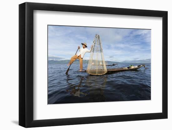 Myanmar, Inle Lake. Young Fisherman Demonstrates a Traditional Rowing Technique-Brenda Tharp-Framed Photographic Print