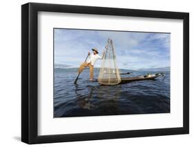 Myanmar, Inle Lake. Young Fisherman Demonstrates a Traditional Rowing Technique-Brenda Tharp-Framed Photographic Print