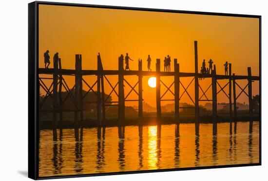 Myanmar. Mandalay. Amarapura. Tourists on the U Bein Bridge at Sunset-Inger Hogstrom-Framed Stretched Canvas