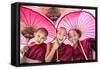 Myanmar, Mandalay Division, Bagan. Portrait of Three Novice Monks under Red Umbrellas (Mr)-Matteo Colombo-Framed Stretched Canvas