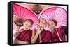Myanmar, Mandalay Division, Bagan. Portrait of Three Novice Monks under Red Umbrellas (Mr)-Matteo Colombo-Framed Stretched Canvas