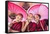 Myanmar, Mandalay Division, Bagan. Portrait of Three Novice Monks under Red Umbrellas (Mr)-Matteo Colombo-Framed Stretched Canvas