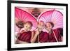 Myanmar, Mandalay Division, Bagan. Portrait of Three Novice Monks under Red Umbrellas (Mr)-Matteo Colombo-Framed Photographic Print