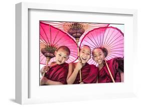 Myanmar, Mandalay Division, Bagan. Portrait of Three Novice Monks under Red Umbrellas (Mr)-Matteo Colombo-Framed Photographic Print