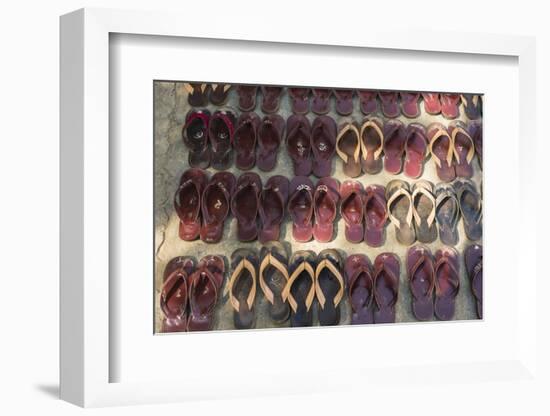 Myanmar. Mandalay. Maha Aung Myae Bone San Monastery. Lines of Shoes-Inger Hogstrom-Framed Photographic Print