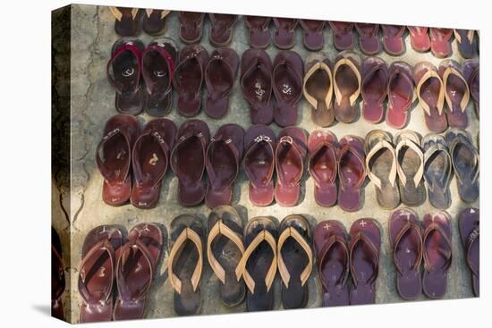 Myanmar. Mandalay. Maha Aung Myae Bone San Monastery. Lines of Shoes-Inger Hogstrom-Stretched Canvas