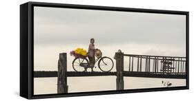 Myanmar, Mandalay. Woman Walks Her Flower-Laden Bicycle across U Bein Bridge-Brenda Tharp-Framed Stretched Canvas