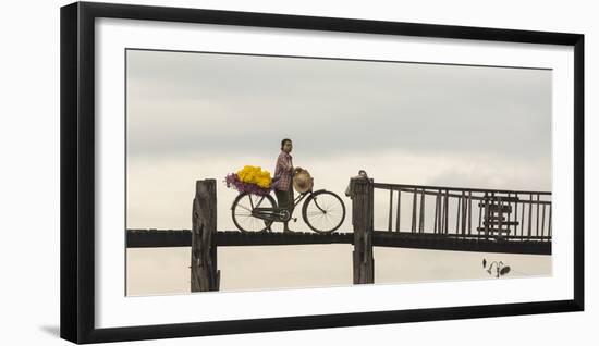 Myanmar, Mandalay. Woman Walks Her Flower-Laden Bicycle across U Bein Bridge-Brenda Tharp-Framed Photographic Print