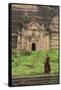 Myanmar, Mingun. a Young Monk Walking Beneath a Massive Temple Wall at Ruins of Mingun Pahtodawgyi-Brenda Tharp-Framed Stretched Canvas