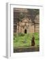 Myanmar, Mingun. a Young Monk Walking Beneath a Massive Temple Wall at Ruins of Mingun Pahtodawgyi-Brenda Tharp-Framed Photographic Print