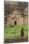 Myanmar, Mingun. a Young Monk Walking Beneath a Massive Temple Wall at Ruins of Mingun Pahtodawgyi-Brenda Tharp-Mounted Photographic Print