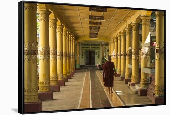 Myanmar. Monk Walks Down Hallway in Monastery-Brenda Tharp-Framed Stretched Canvas