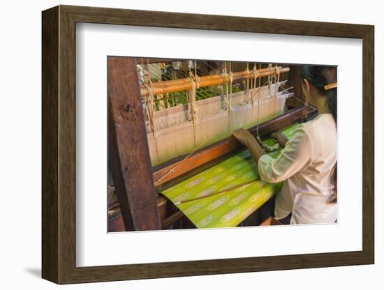 Myanmar. Shan State. Inle Lake. Woman weaving silk at a wooden loom.-Inger Hogstrom-Framed Photographic Print