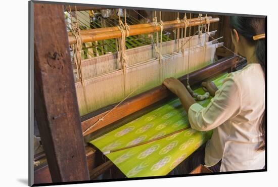 Myanmar. Shan State. Inle Lake. Woman weaving silk at a wooden loom.-Inger Hogstrom-Mounted Photographic Print
