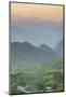 Myanmar. Shan State. Sunset over the Ridges of Haze-Filled Hills-Inger Hogstrom-Mounted Photographic Print
