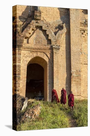 Myanmar Taj Mahal. Unfinished Pagoda. Monks. Mandalay. Myanmar-Tom Norring-Stretched Canvas