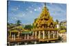 Myanmar. Yangon. Kyay Thone Pagoda. Buddhist Flags in the Breeze-Inger Hogstrom-Stretched Canvas