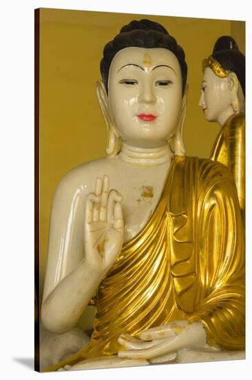 Myanmar. Yangon. Shwedagon Pagoda. Buddha in the Discussion Mudra-Inger Hogstrom-Stretched Canvas