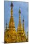 Myanmar. Yangon. Shwedagon Pagoda. Golden Spires Gleam at Twilight-Inger Hogstrom-Mounted Photographic Print