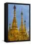 Myanmar. Yangon. Shwedagon Pagoda. Golden Spires Gleam at Twilight-Inger Hogstrom-Framed Stretched Canvas