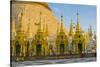 Myanmar. Yangon. Shwedagon Pagoda. Locals Lighting Candles-Inger Hogstrom-Stretched Canvas