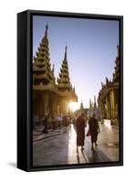 Myanmar, Yangon. Two Buddhist Monks Walking Inside Shwedagon Pagoda Complex at Sunset (Mr)-Matteo Colombo-Framed Stretched Canvas