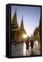 Myanmar, Yangon. Two Buddhist Monks Walking Inside Shwedagon Pagoda Complex at Sunset (Mr)-Matteo Colombo-Framed Stretched Canvas