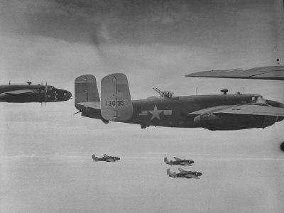 Flight of American B-25 Mitchell Bombers Enroute to a Bombing Mission over the Port of Madang