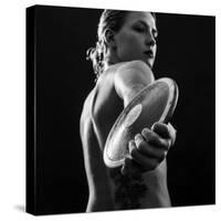 Naked female athlete posing with discus in hand-Panoramic Images-Stretched Canvas