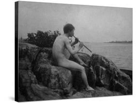 Naked Man Playing His Pipe Photograph-Lantern Press-Stretched Canvas