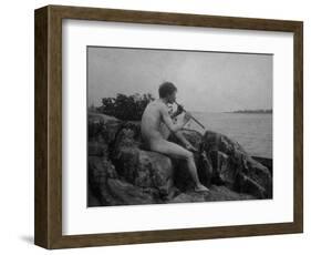 Naked Man Playing His Pipe Photograph-Lantern Press-Framed Art Print