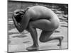 Naked woman posing on edge of swimming pool-Panoramic Images-Mounted Photographic Print